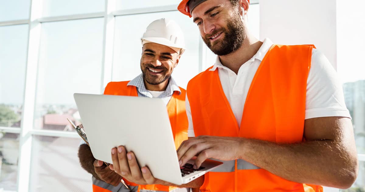 construction person with laptop